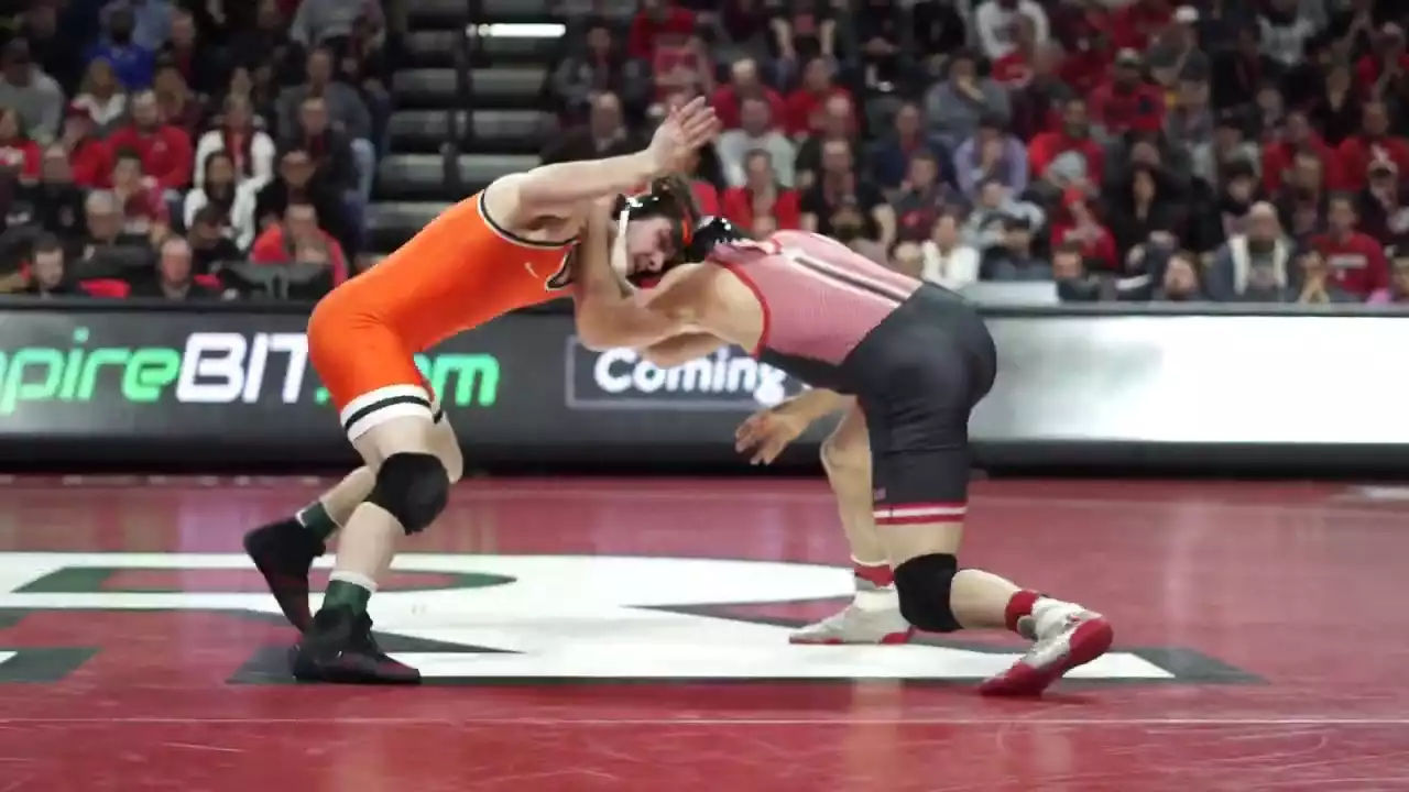 Pennsylvania Quakers at Rutgers Scarlet Knights Wrestling performing live at Jersey Mike's Arena.